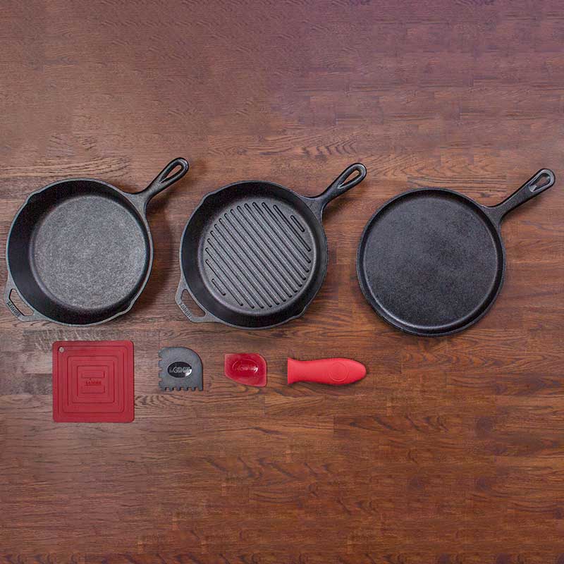 Lodge 7-Piece Essential Pre-Seasoned Cast Iron Skillet Set - Includes 10  1/4 Skillet, 10 1/4 Grill Pan, 10 1/2 Griddle, Silicone Handle Holder